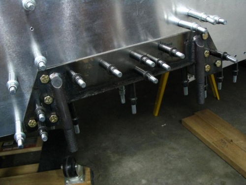 There used to be an extra hole (too close to the main gear attachment for comfort).  Voila, it is gone