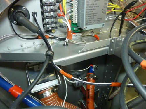 Routing and pass through of ignition wires