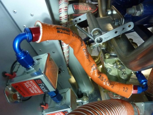 Fuel line from pumps to carb, with firesleeve ready to clamp
