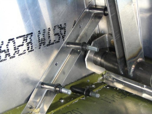 Double bracing around flap control tube exit