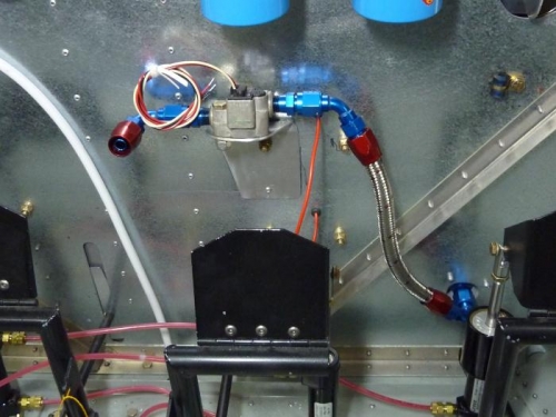 Floscan fuel meter mounted horizontally on the passenger side of the firewall