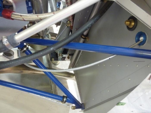 Control cable routing through the eyeball pass through