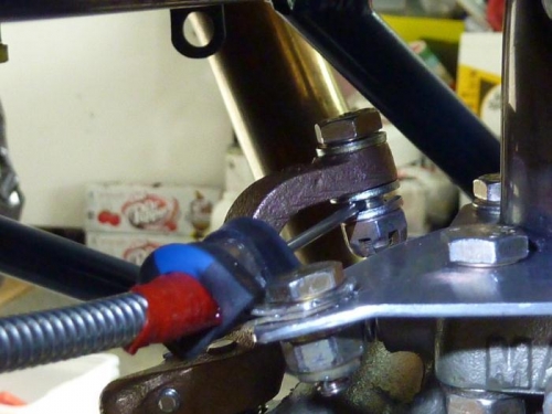 Swivel bolt in place on mixture lever
