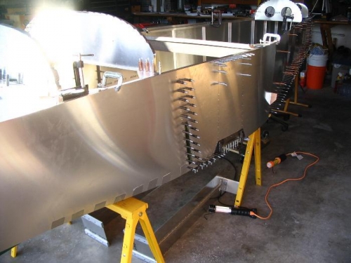 Wing Attachment Upright rivet lines from the front