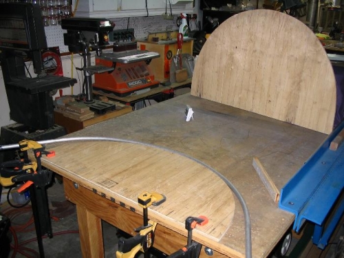 Bending the front canopy frame (rear frame in background)