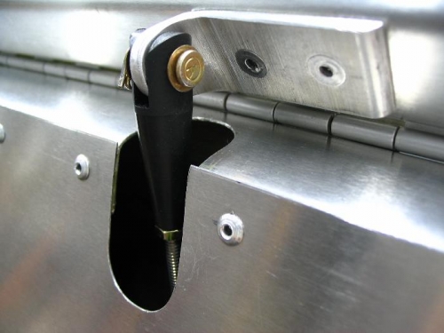 Actuator control rod pushing the trim tab up