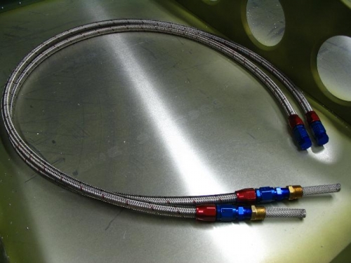 Initial hoses with test plugs