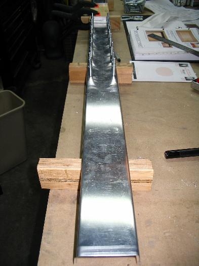 Front spar cap doublers drilled and clecoed in place