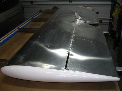 Everything riveted except the fiberglass tips.  That happens after mounting the tail to the fuselage.