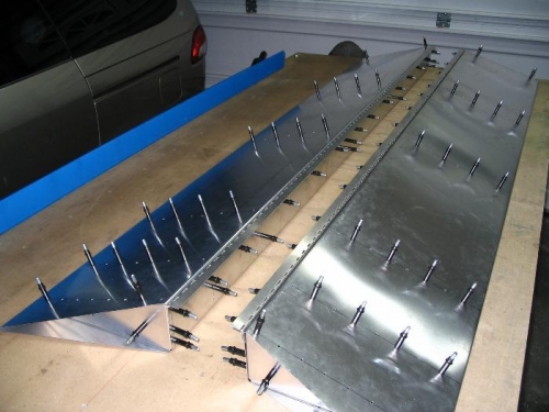 Hinges in place and ready to deburr and rivet
