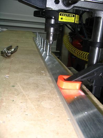 Match drilling through the pre-drilled cap to the doubler