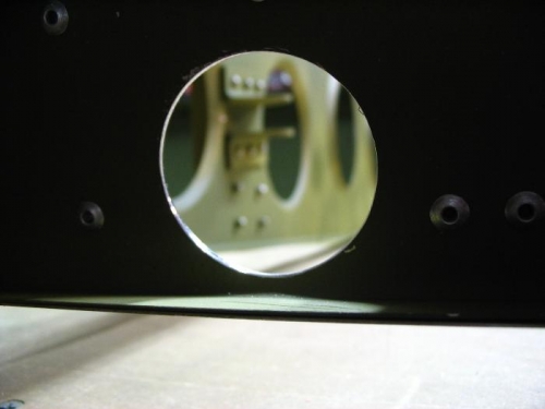 Aileron bellcrank support as seen through the aileron control rod hole