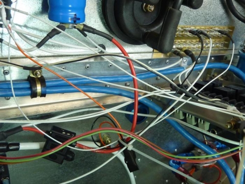 Left and right cables combine and go through Adel clamp