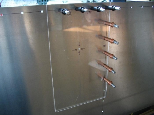 Plexiglass template for drilling fuel cap hole