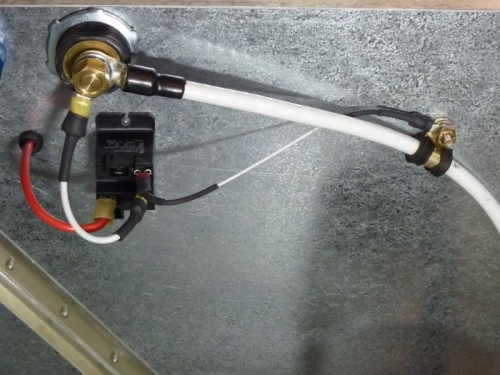 Starter relay on cockpit side of firewall