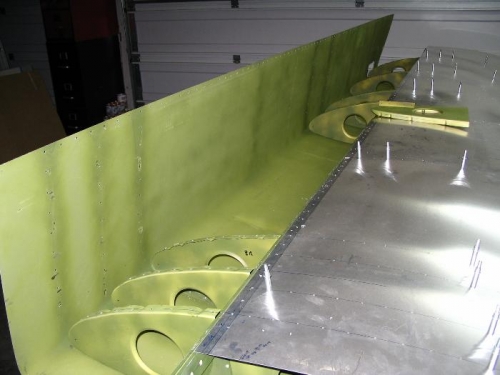 Right wing with pre-drilled holes for new rib