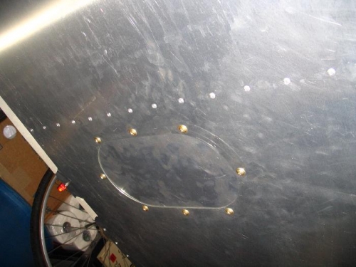 Left wing aileron access cover installed