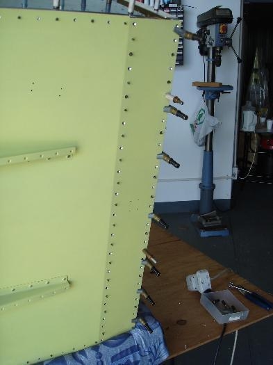 Machine countersinking Fwd floor panel