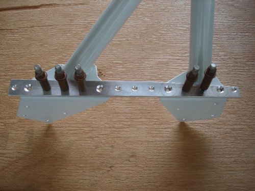Countersinking cockpit rail spacers using seatback as a guide
