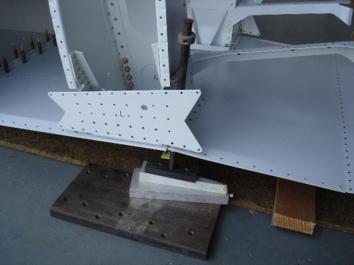 Dimpling Fwd floor panel with C-frame shafts & spacers