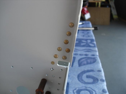 Squeezed rivets - note flush rivet behind mid cabin brace