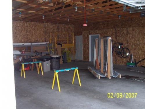 Padded metal sawhorses for the fuselage and a home-made wing-sling for the wings