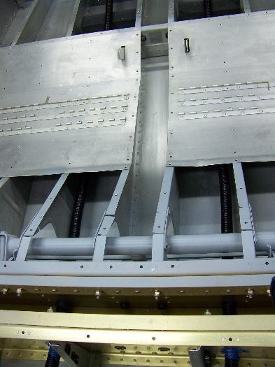 Conduits continuing under the seats