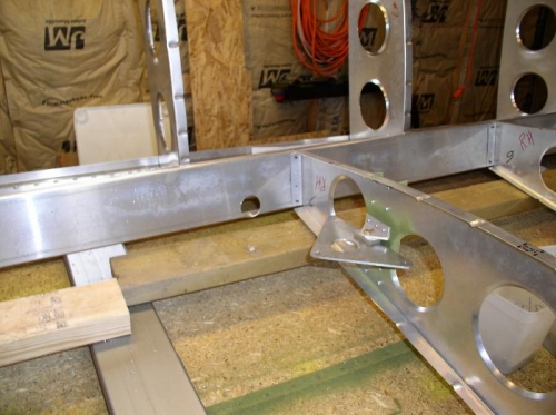 Aileron control rod hole