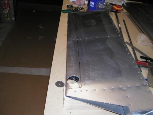 Hole saw used to cut top and bottom skin