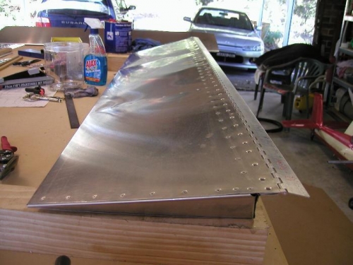 Right aileron riveting complete