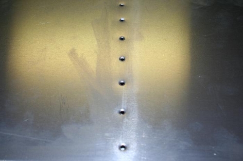 Dimples formed using the dies and hand riveter