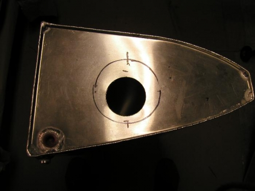 Hole for the fuel sender cut in the side of the tank