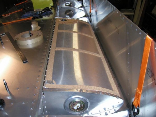 Fuel tank with cork strips in place and vent and drain holes drilled