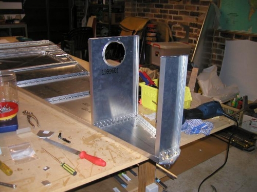 Rear formers riveted and bolted in place