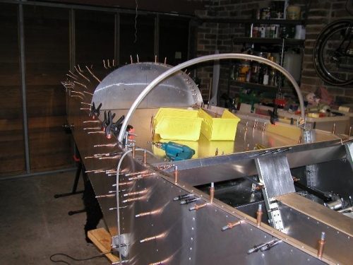 Front hoop cut to size and clecoed in place