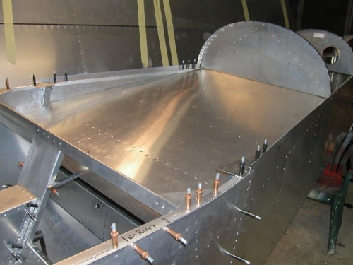 Left view, baggage floor pop riveted into place