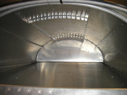 Baggage compartment with L angle stiffeners