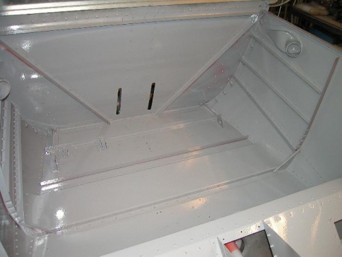 First coat of gloss gray applied to the interior of the fuselage