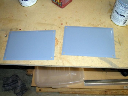 Spar access hatch covers painted