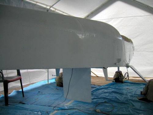 The fuselage received a coat of white paint from the centre rail down