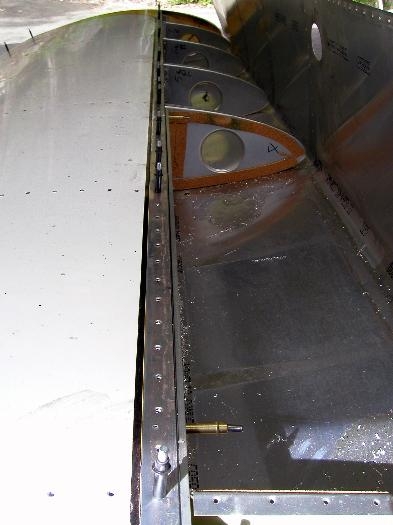 Another view of the skin sitting flat on the spar after countersinking