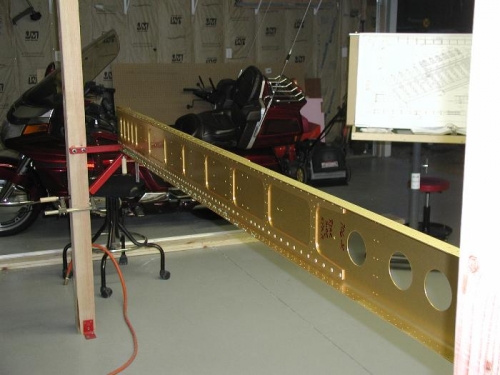 Right spar after riveting the 72 nut plates to flange