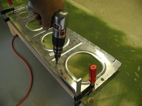 Center drilled location first.  Drilled to 13/16 with unabit.