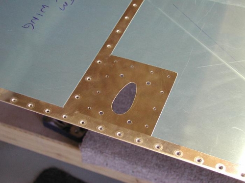 Cut hole in wing skin for pitot tube.