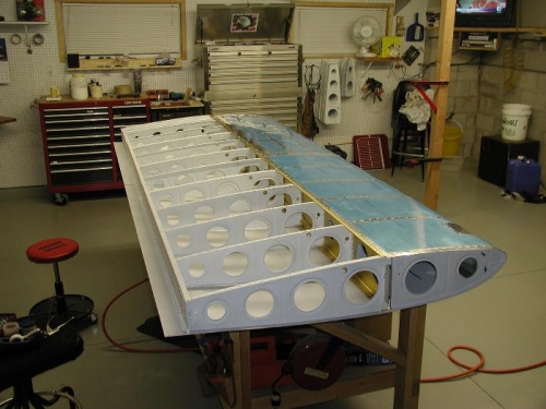 Left wing on bench after top skin was riveted on.