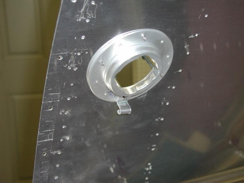 Fuel cap retainer from the inside of the left fuel tank.