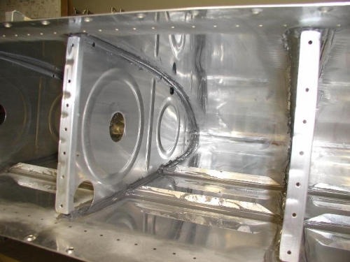 Installing ribs in left tank.