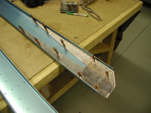Drilled both reinforcement plates for rear spar