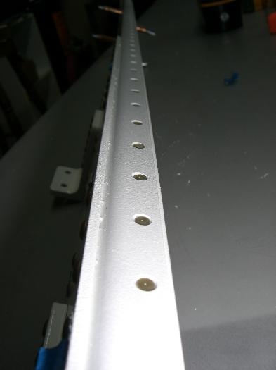 Here you can see the slight offset of the manufactured rivet head to the spar flange