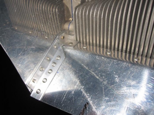 parts 10S and 10SF riveted in place